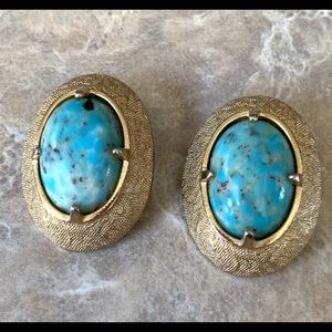 Josef Bobley clip earrings.